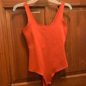 Orange bodysuit